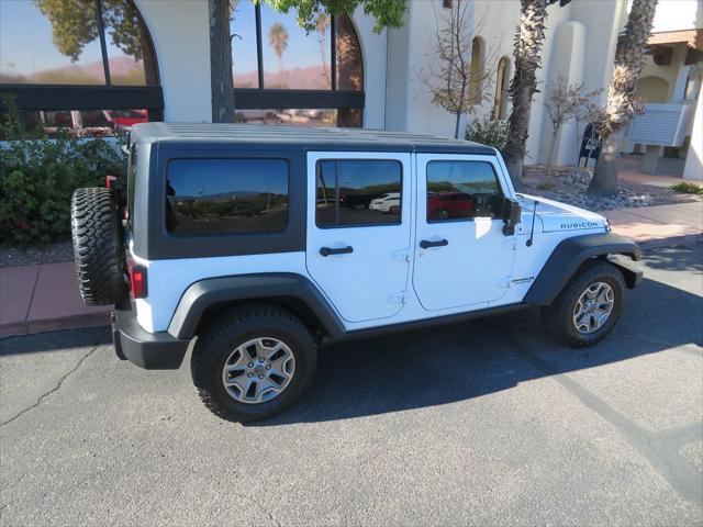 used 2015 Jeep Wrangler Unlimited car, priced at $21,995