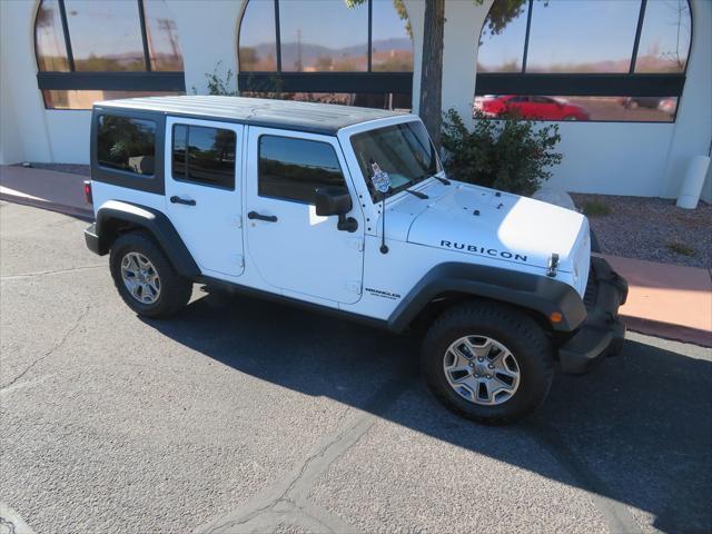 used 2015 Jeep Wrangler Unlimited car, priced at $21,995