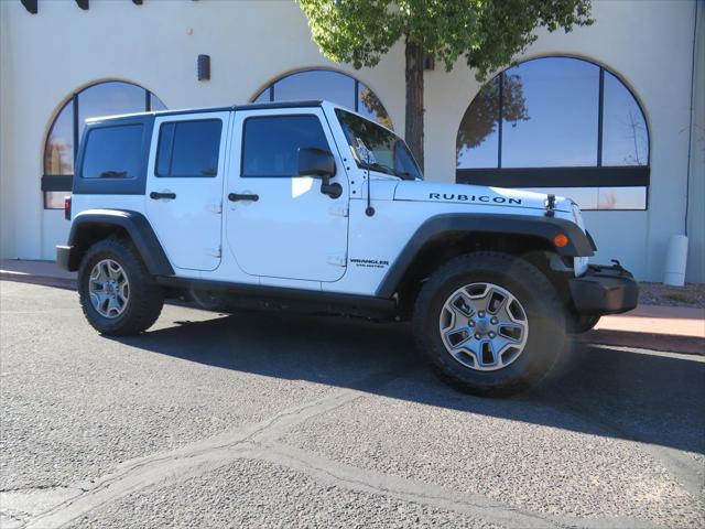 used 2015 Jeep Wrangler Unlimited car, priced at $21,995