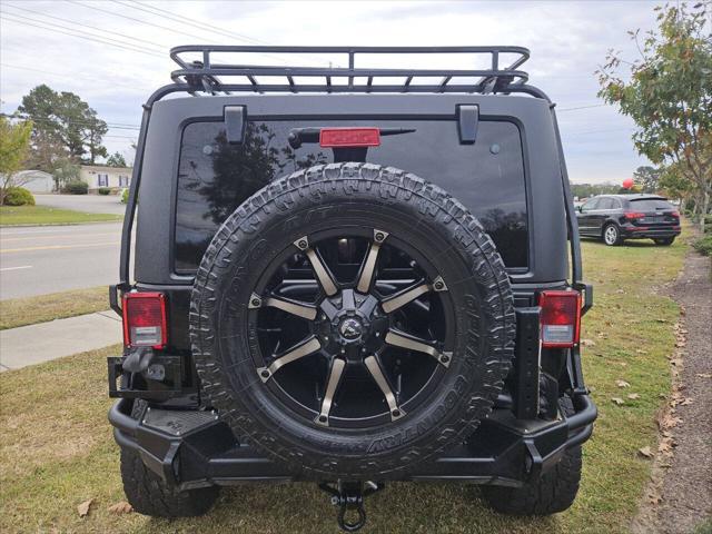 used 2015 Jeep Wrangler Unlimited car, priced at $20,495