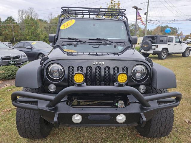 used 2015 Jeep Wrangler Unlimited car, priced at $20,495