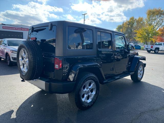 used 2015 Jeep Wrangler Unlimited car, priced at $19,300