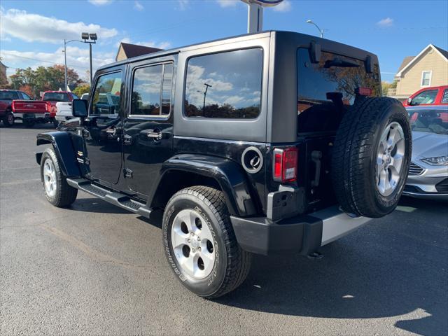 used 2015 Jeep Wrangler Unlimited car, priced at $19,300