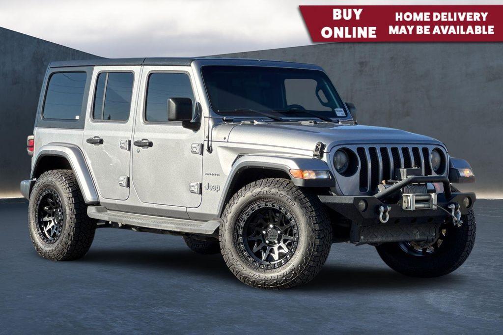 used 2019 Jeep Wrangler Unlimited car, priced at $23,631