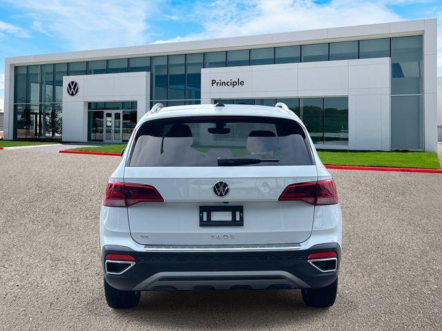 used 2023 Volkswagen Taos car, priced at $20,596