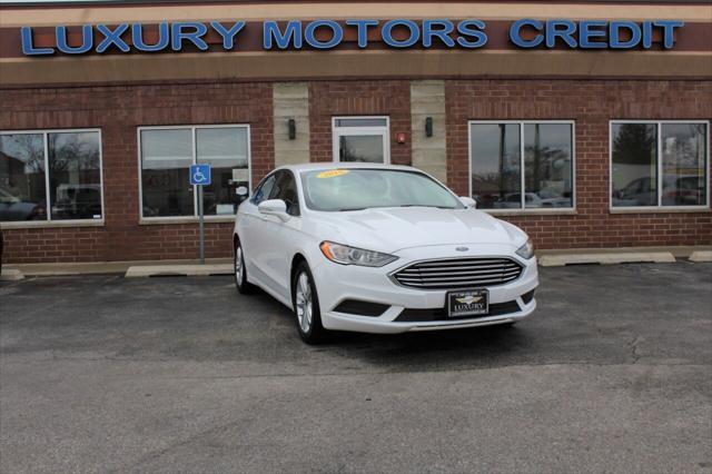 used 2018 Ford Fusion car, priced at $12,524