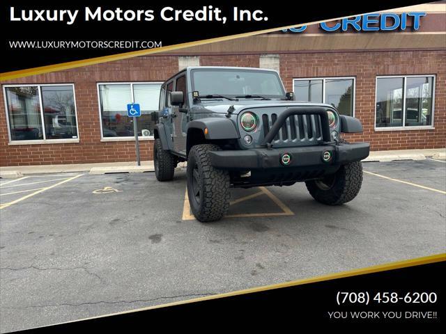 used 2014 Jeep Wrangler Unlimited car, priced at $14,457