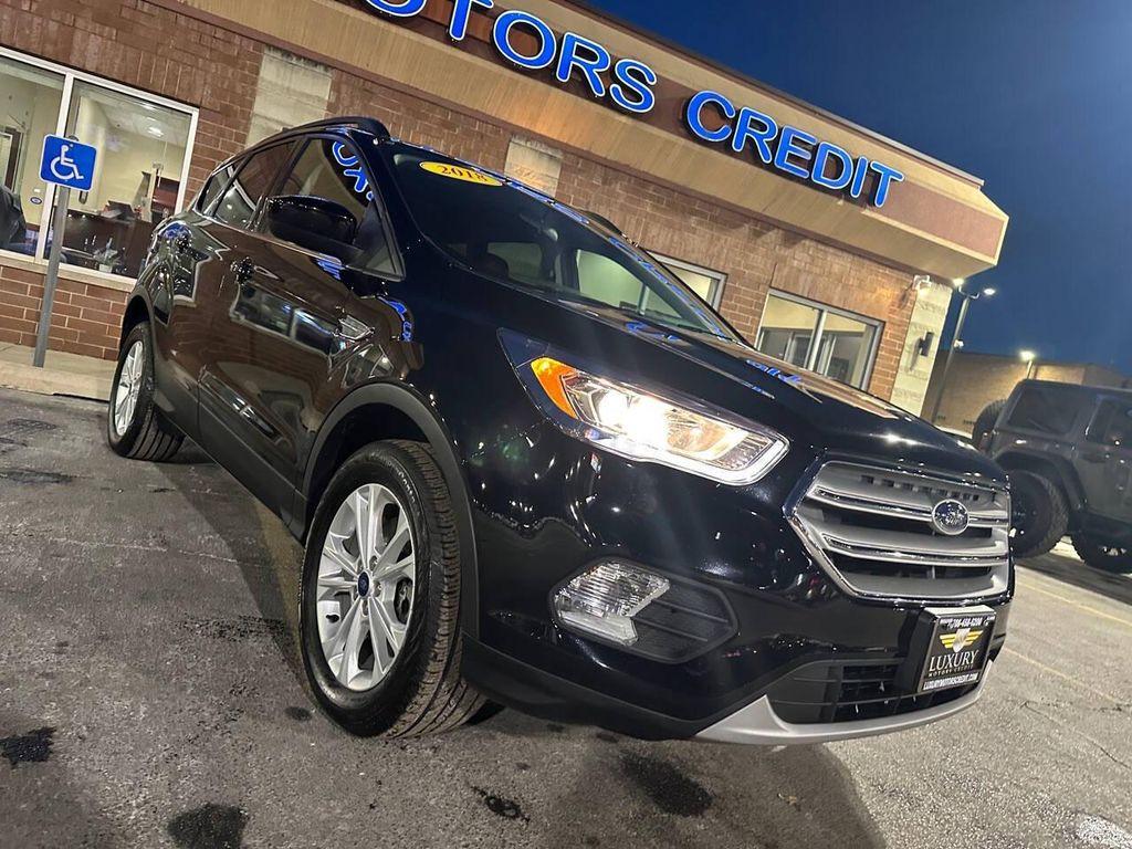 used 2018 Ford Escape car, priced at $12,623