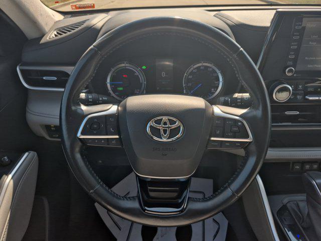 used 2021 Toyota Highlander Hybrid car, priced at $26,999