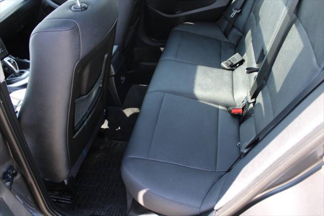used 2014 BMW X1 car, priced at $10,900