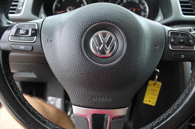 used 2014 Volkswagen Passat car, priced at $4,999