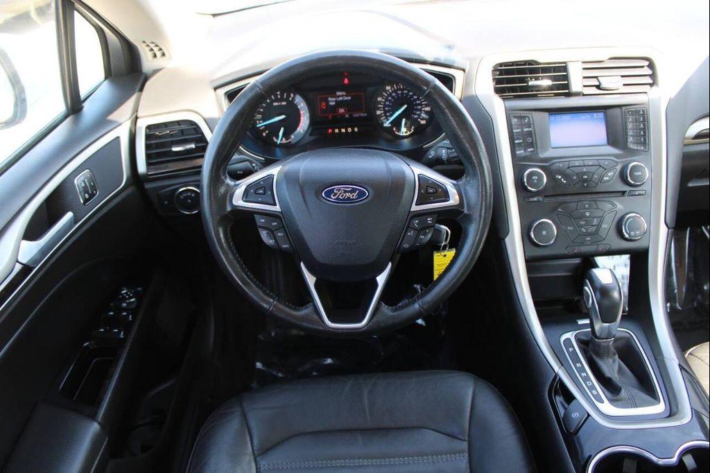 used 2014 Ford Fusion car, priced at $5,999