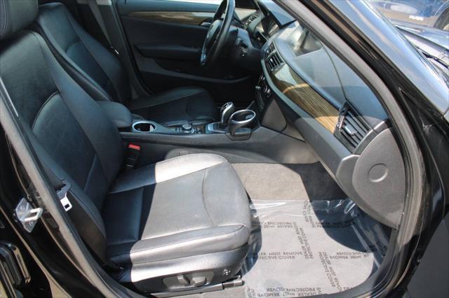used 2013 BMW X1 car, priced at $8,999