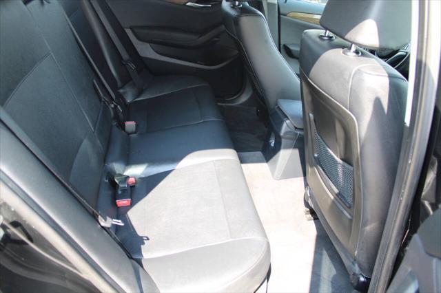 used 2013 BMW X1 car, priced at $8,999
