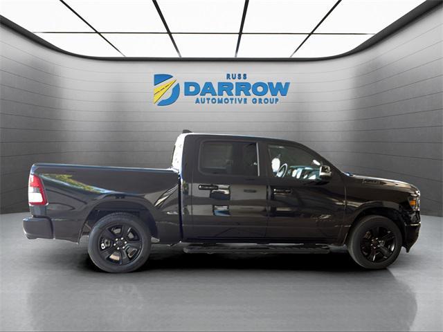 used 2021 Ram 1500 car, priced at $29,028