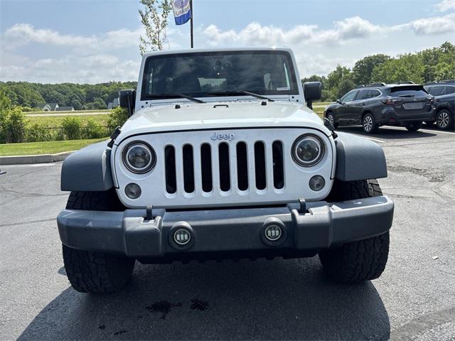used 2016 Jeep Wrangler Unlimited car, priced at $19,530