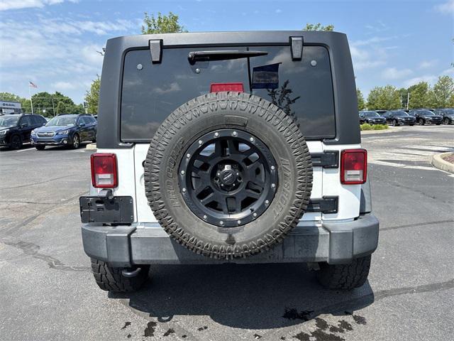 used 2016 Jeep Wrangler Unlimited car, priced at $19,530