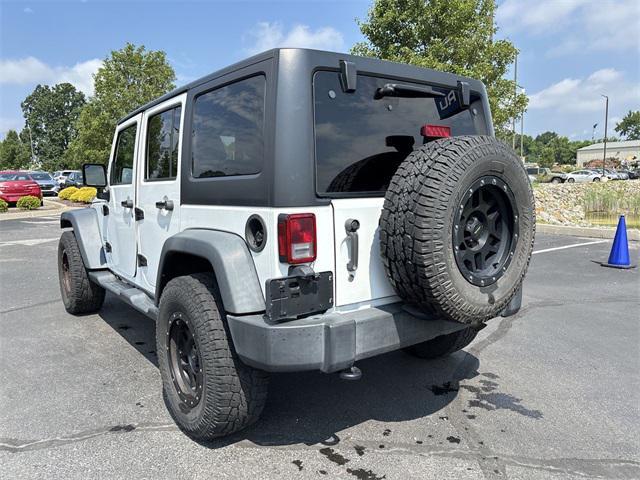 used 2016 Jeep Wrangler Unlimited car, priced at $19,530
