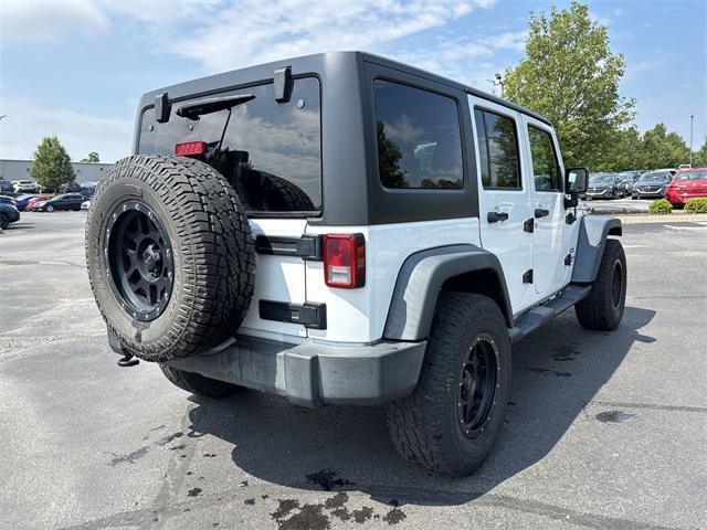 used 2016 Jeep Wrangler Unlimited car, priced at $19,530