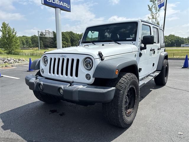 used 2016 Jeep Wrangler Unlimited car, priced at $19,530