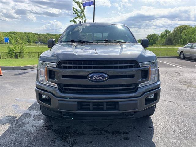 used 2018 Ford F-150 car, priced at $23,374