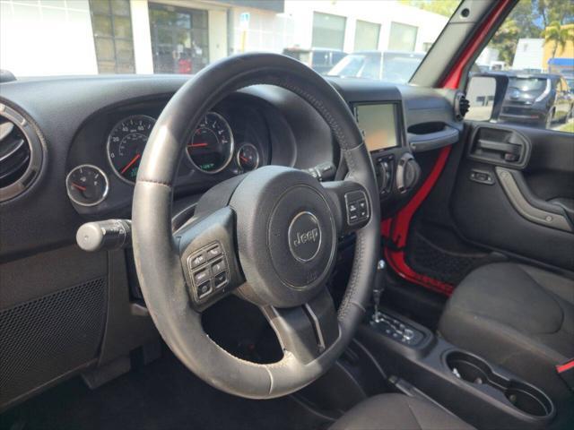 used 2015 Jeep Wrangler Unlimited car, priced at $16,999