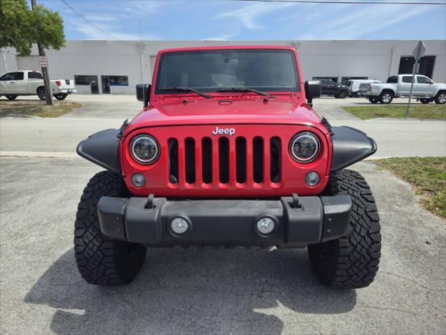 used 2015 Jeep Wrangler Unlimited car, priced at $16,999