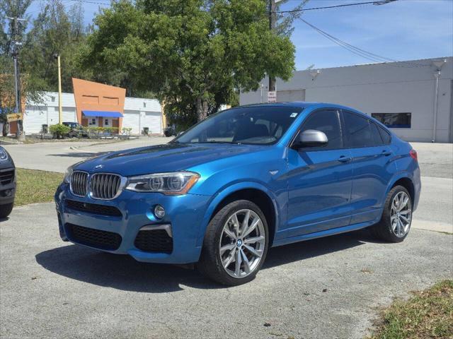 used 2016 BMW X4 car, priced at $19,999