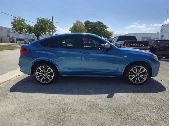 used 2016 BMW X4 car, priced at $19,999