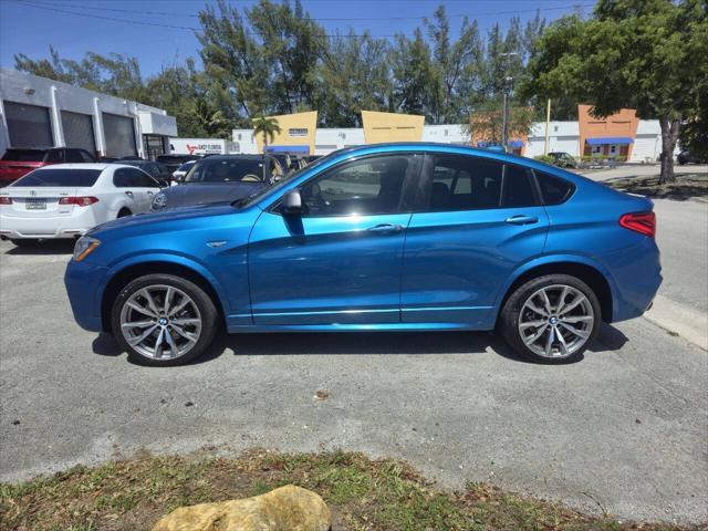 used 2016 BMW X4 car, priced at $19,999