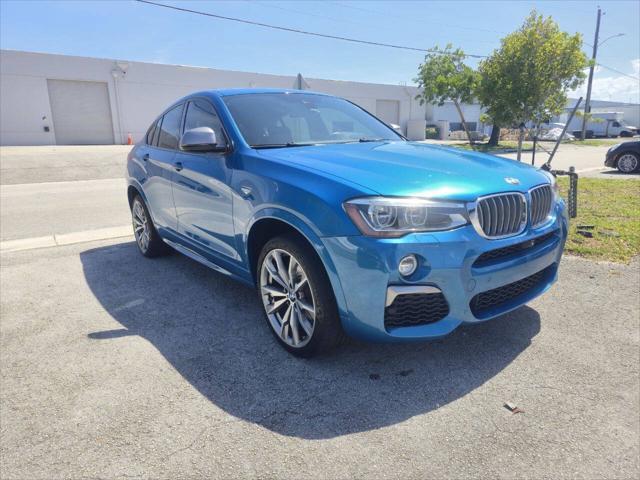 used 2016 BMW X4 car, priced at $19,999