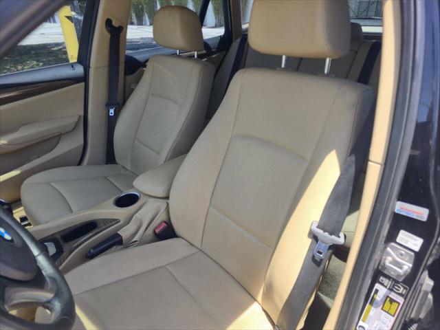 used 2014 BMW X1 car, priced at $4,999
