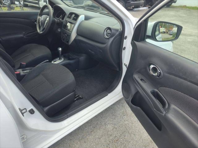used 2015 Nissan Versa car, priced at $5,999