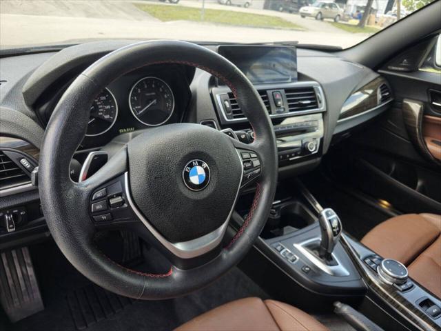 used 2015 BMW 228 car, priced at $16,999