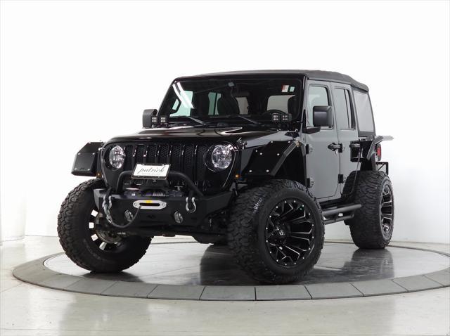 used 2021 Jeep Wrangler Unlimited car, priced at $32,920