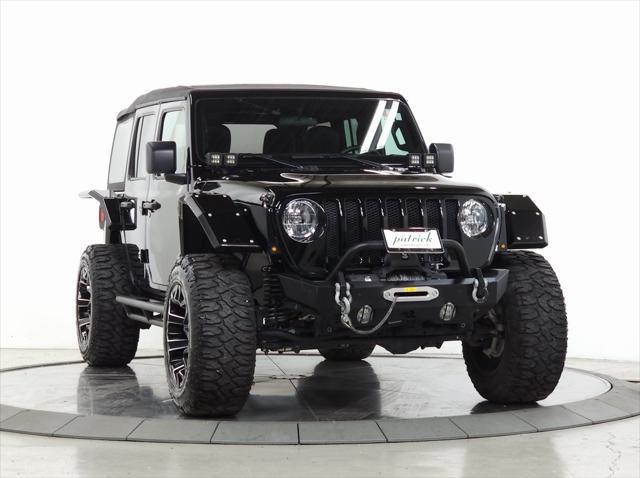 used 2021 Jeep Wrangler Unlimited car, priced at $32,920