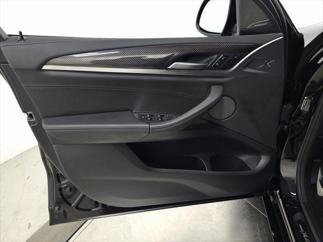 used 2024 BMW X4 M car, priced at $72,910
