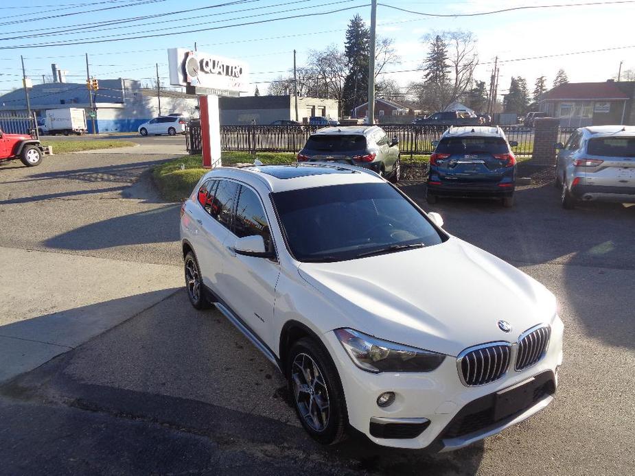 used 2018 BMW X1 car, priced at $18,000