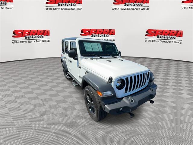 used 2023 Jeep Wrangler car, priced at $33,421