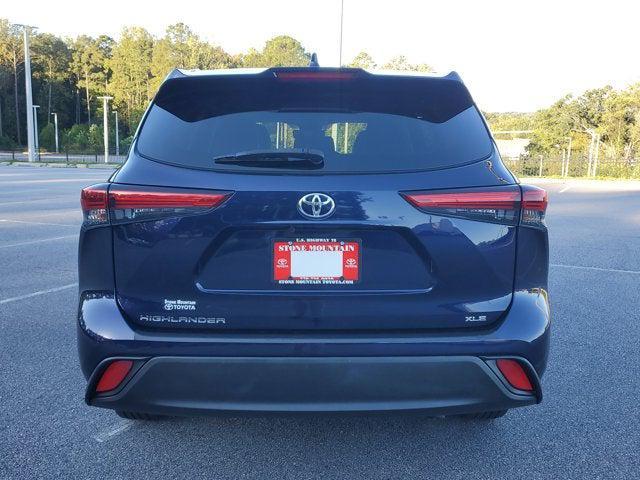 used 2023 Toyota Highlander car, priced at $32,099