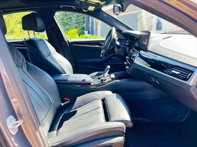 used 2022 BMW M550 car, priced at $57,991