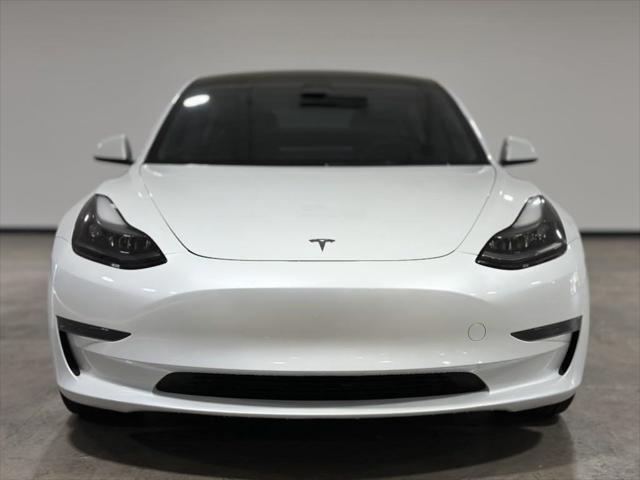 used 2023 Tesla Model 3 car, priced at $27,995