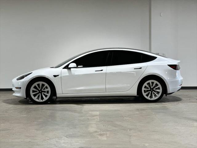 used 2023 Tesla Model 3 car, priced at $27,995