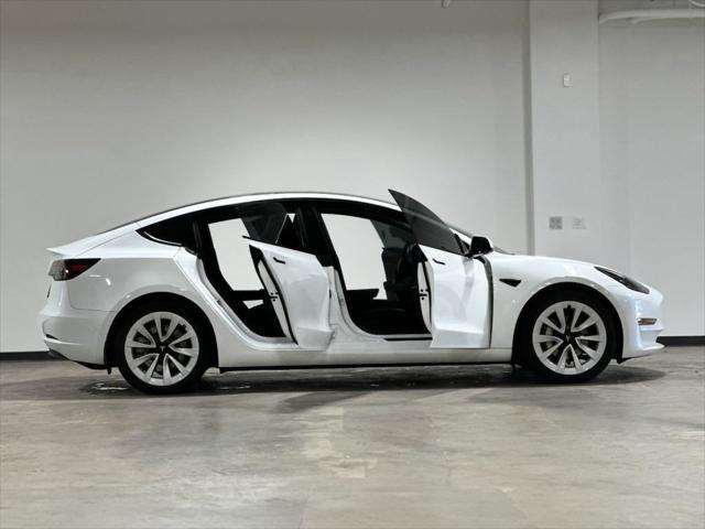 used 2023 Tesla Model 3 car, priced at $27,995