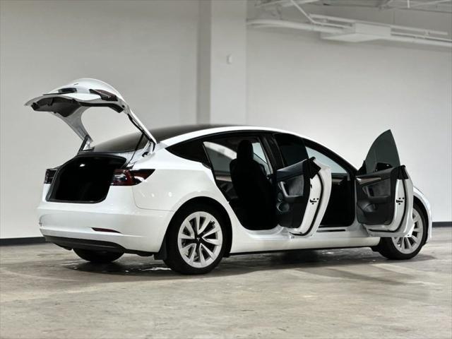 used 2023 Tesla Model 3 car, priced at $27,995