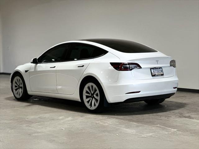 used 2023 Tesla Model 3 car, priced at $27,995