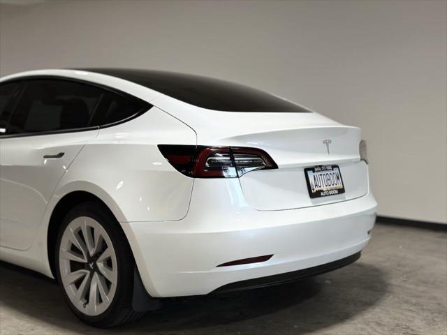 used 2023 Tesla Model 3 car, priced at $27,995