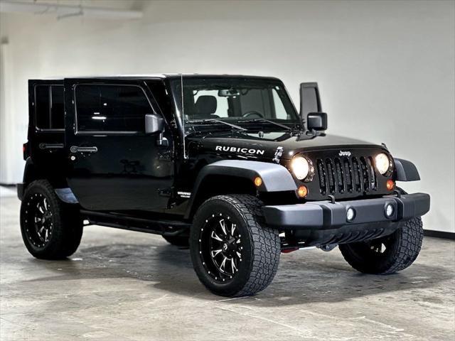 used 2013 Jeep Wrangler Unlimited car, priced at $21,995