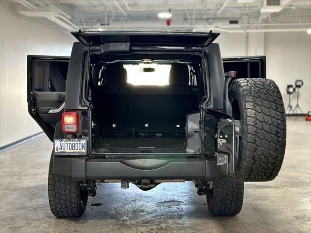 used 2013 Jeep Wrangler Unlimited car, priced at $21,995