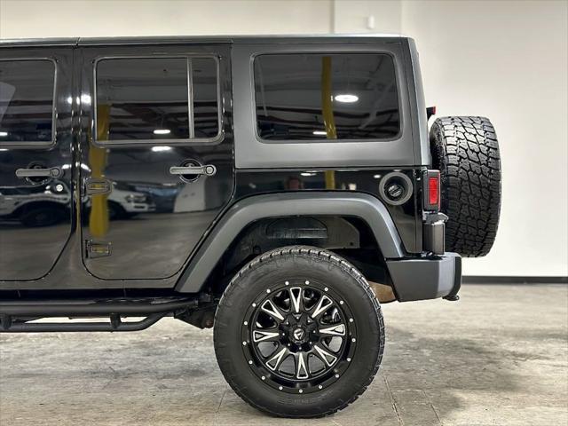 used 2013 Jeep Wrangler Unlimited car, priced at $21,995